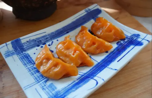 22-8 Gyoza de Pato laquedado con Brote de Bambú 